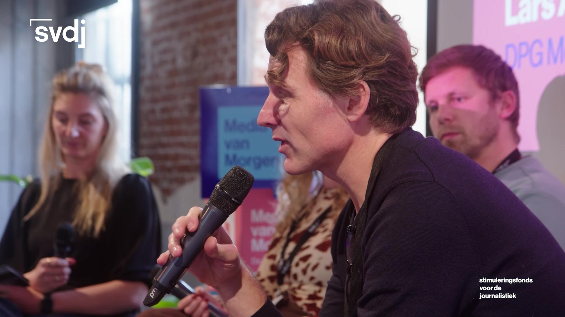 Spreker met microfoon tijdens Media van Morgen 2025
