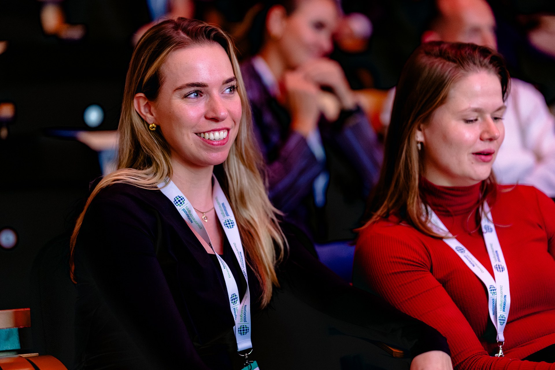 Publieksreacties tijdens een congrespresentatie. Nationaal Douanecongres 2026, Rotterdam. Fotografie: Leroy Beesemer, in samenwerking met Youngblood Productions.